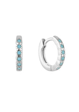 Silver hoop earrings with turquoise stones on a white background