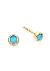 Simple, hypoallergenic, fourteen karat gold plated studs on a sterling silver base with a delicate faux turquoise stone. 