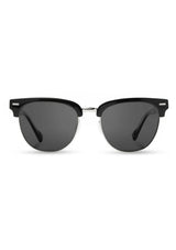 [Color: Black] Sunglasses with black frames and dark lenses  made by Shwood. 