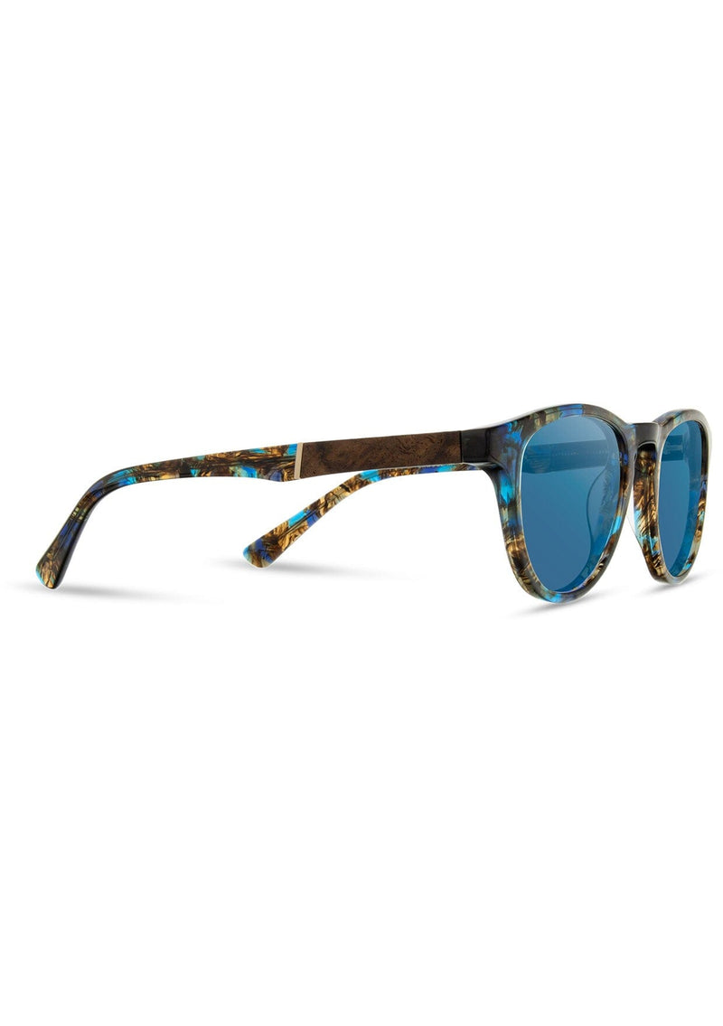 [Color: Blue Nebula] Sunglasses with a blue lens and a wood inlay.