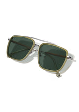 [Color: Pine] A pair of Shwood Grant sunglasses with a boxy silhouette, featuring dark green lenses with a sage green and gun-metal colored frame.