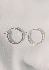 [Color: Silver] A classic silver colored hoop earring, made with hypoallergenic white gold plated sterling silver. 