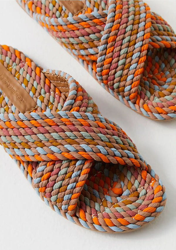 [Color: Sun-Bleached Pastel] A colorful hand dyed woven rope slide sandal with crossover top straps. Sustainably made in small batches. 