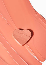 [Color: Dahlia] A lightweight, creamy blush with nourishing ingredients.