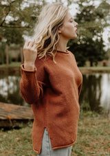 [Color: Toffee] Essential honeycomb knit sweater. A versatile layering style featuring a rolled neckline and hemline with side vents.