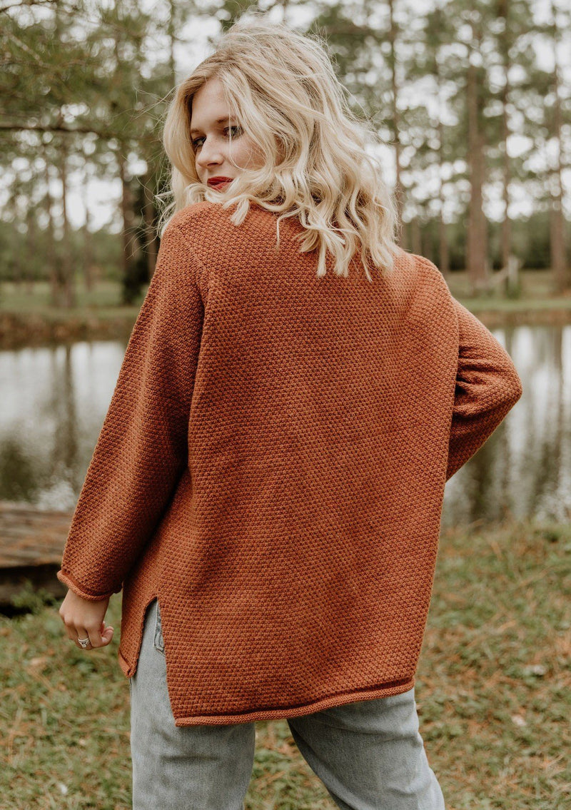 [Color: Toffee] Essential honeycomb knit sweater. A versatile layering style featuring a rolled neckline and hemline with side vents.