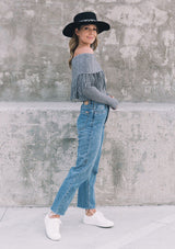 [Color: Heather Charcoal] Bohemian chic off shoulder ribbed sweater with fringe detail. 