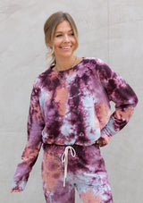 [Color: Berry Peach] A casual pink and orange tie dye crewneck pullover sweatshirt.
