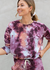 [Color: Berry Peach] A casual pink and orange tie dye crewneck pullover sweatshirt.