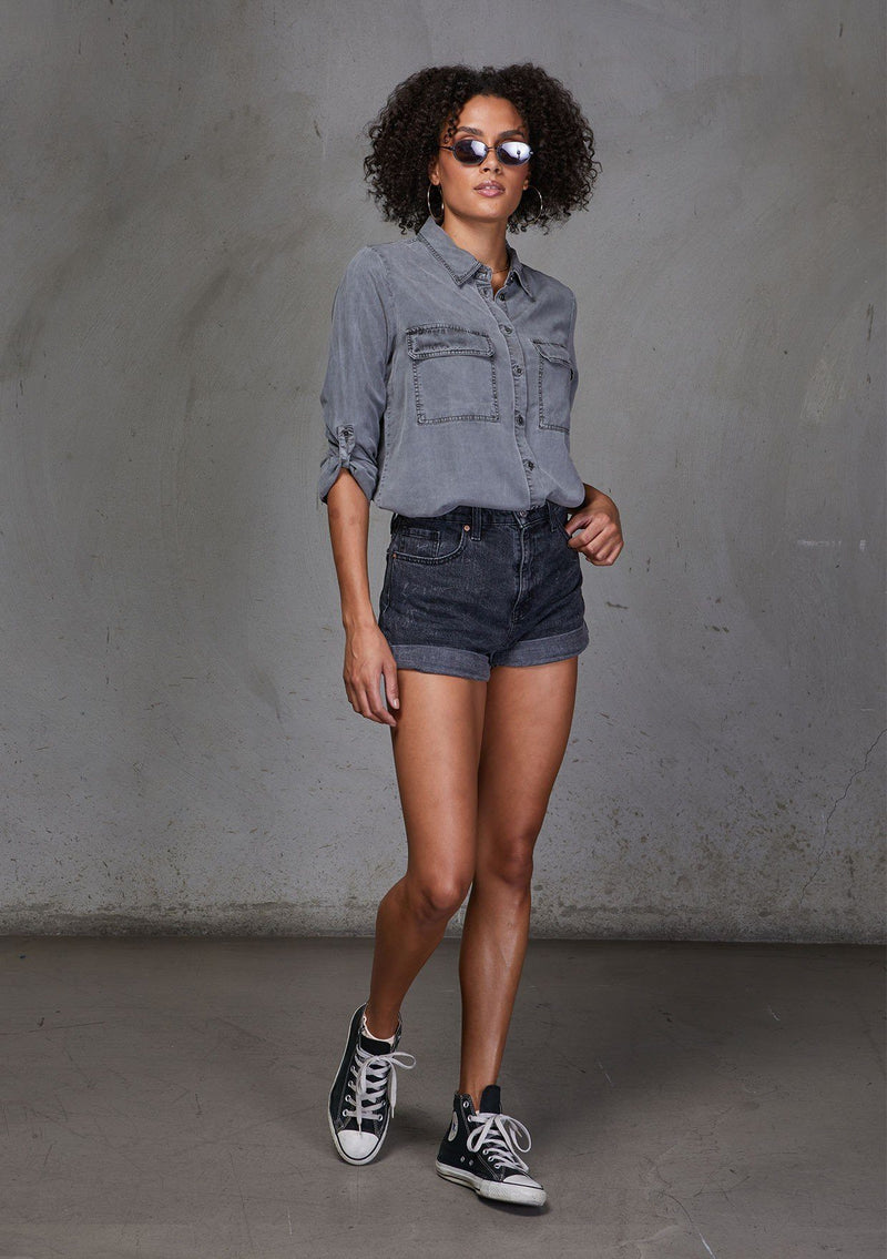 [Color: Charcoal] An ultra soft tie front top, featuring front flap patch pockets, button tab rolled sleeves and a trendy tie front detail. Paired here with denim.