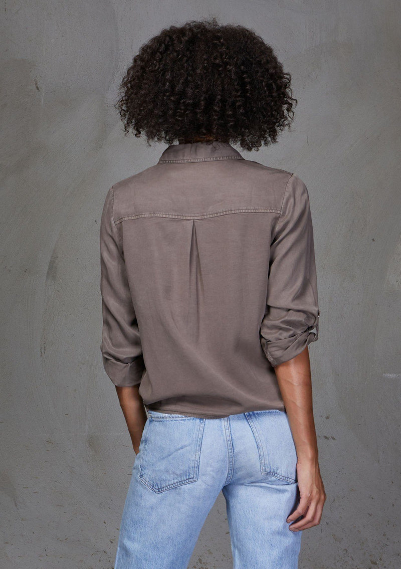 [Color: Mushroom] An ultra soft tie front top, featuring front flap patch pockets, button tab rolled sleeves and a trendy tie front detail. Paired here with denim.