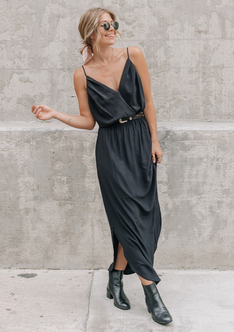 [Color: Black] It does not get much better than this stunning maxi dress. Featuring a sexy low back, a deep v neckline wrap top, and subtle side slits for movement. 