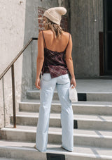[Color: Burgundy] A lightweight cotton plaid camisole featuring a sexy wrap back detail with side tie closure, double spaghetti straps, and a flattering scooped neckline. An ultra cute style that is paired here with denim and heeled sandals.