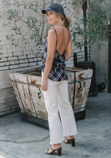 [Color: Navy] A lightweight cotton plaid camisole featuring a sexy wrap back detail with side tie closure, double spaghetti straps, and a flattering scooped neckline. An ultra cute style that is paired here with denim and heeled sandals.