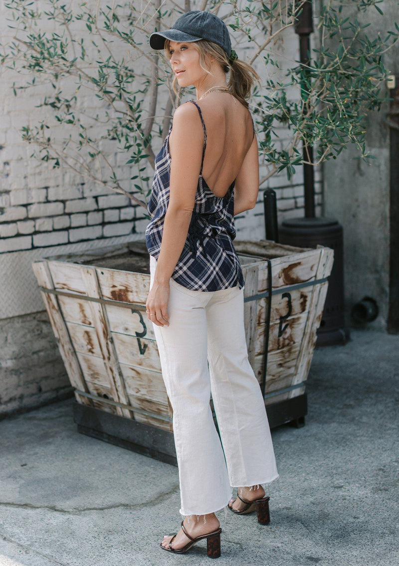 [Color: Navy] A lightweight cotton plaid camisole featuring a sexy wrap back detail with side tie closure, double spaghetti straps, and a flattering scooped neckline. An ultra cute style that is paired here with denim and heeled sandals.