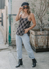 [Color: Black] A lightweight cotton plaid camisole featuring a sexy wrap back detail with side tie closure, double spaghetti straps, and a flattering scooped neckline. An ultra cute style that is paired here with denim and heeled sandals.