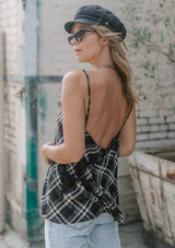 [Color: Black] A lightweight cotton plaid camisole featuring a sexy wrap back detail with side tie closure, double spaghetti straps, and a flattering scooped neckline. An ultra cute style that is paired here with denim and heeled sandals.