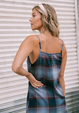 [Color: Dusty Blue] Throw it back to the nineties with our effortlessly chic and easy plaid midi dress. Made from one hundred percent cotton, this tank top dress features a flattering v neckline with front button detail and breezy side slits for movement. Styled here with a mini backpack and boots.