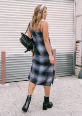 [Color: Dusty Blue] Throw it back to the nineties with our effortlessly chic and easy plaid midi dress. Made from one hundred percent cotton, this tank top dress features a flattering v neckline with front button detail and breezy side slits for movement. Styled here with a mini backpack and boots.