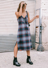 [Color: Dusty Blue] Throw it back to the nineties with our effortlessly chic and easy plaid midi dress. Made from one hundred percent cotton, this tank top dress features a flattering v neckline with front button detail and breezy side slits for movement. Styled here with a mini backpack and boots.