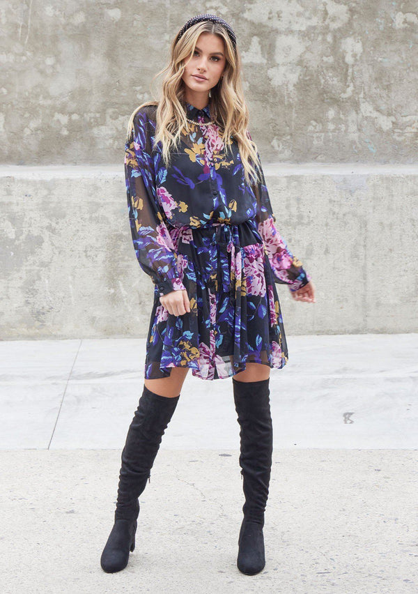 [Color: Black Royal] Get ready to take on Fall with our versatile floral print mini dress. Featuring an elegant self covered button up front, a waist defining self tie belt, and a dropped waist. Pair it with boots for an effortlessly cool Fall look. 