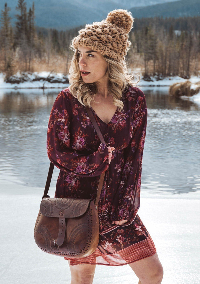 [Color: Wine Spice] A romantic bohemian floral print mini dress. Featuring an empire waist with an adjustable drawstring, voluminous long sleeves, and a flattering v neckline. 