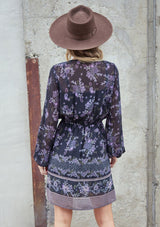 [Color: Black Stone] A romantic bohemian floral print mini dress. Featuring an empire waist with an adjustable drawstring, voluminous long sleeves, and a flattering v neckline. 