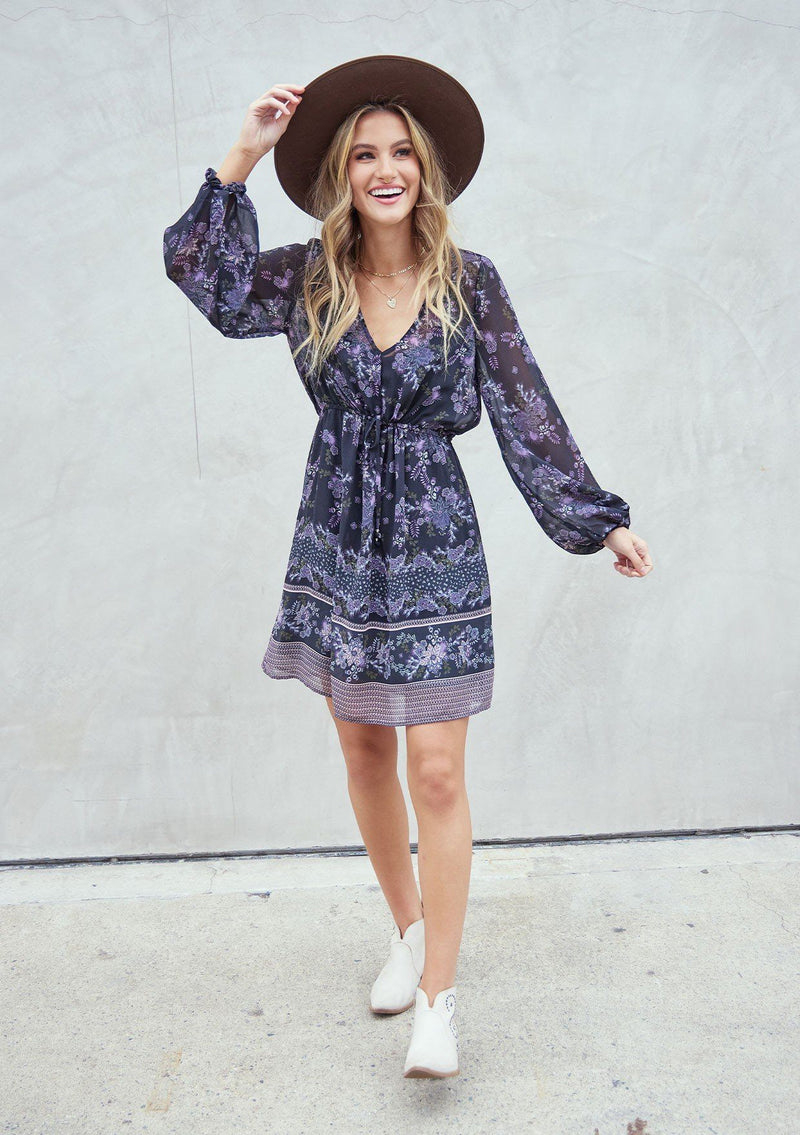 [Color: Black Stone] A romantic bohemian floral print mini dress. Featuring an empire waist with an adjustable drawstring, voluminous long sleeves, and a flattering v neckline. 