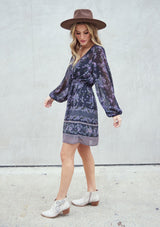 [Color: Black Stone] A romantic bohemian floral print mini dress. Featuring an empire waist with an adjustable drawstring, voluminous long sleeves, and a flattering v neckline. 