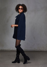 [Color: Navy] A double breasted cape coat. Featuring a chic flyaway silhouette and a soft marled texture. 