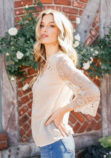 [Color: Stone] Bohemian flowy top featuring pretty crochet bell sleeves and a crochet neckline detail.