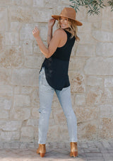 [Color: Black] Girl wearing a mixed media black sleeveless tank top with a scoop neckline.