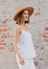 [Color: Ivory/Coral] Girl wearing a white polka dot lace trim tank.