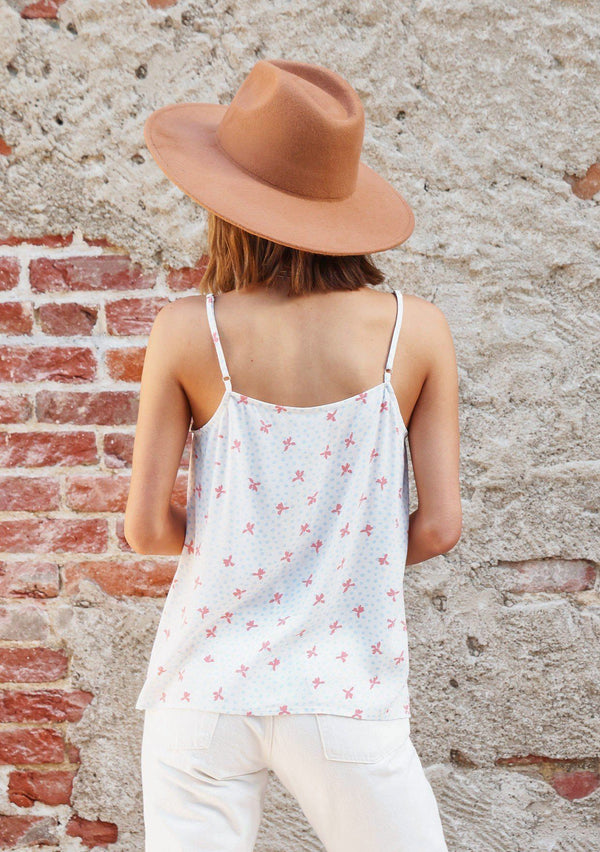 [Color: Ivory/Coral] Girl wearing a white polka dot lace trim tank.