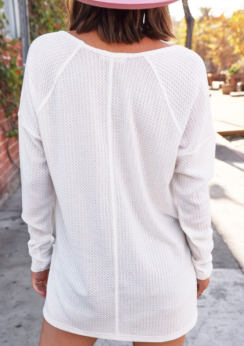 [Color: Cloud] White waffle knit cozy long sleeve pullover top.