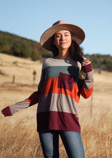 [Color: Port Raspberry] A bold color block striped knit sweater, featuring a contrast front pocket, a wide crew neckline, and an easy, relaxed fit. Perfectly soft and cozy, this lightweight pullover looks great styled with denim.