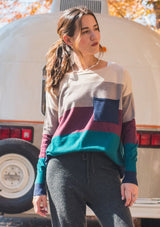 [Color: Heather Eclipse] A bold color block striped knit sweater, featuring a contrast front pocket, a wide crew neckline, and an easy, relaxed fit. Perfectly soft and cozy, this lightweight pullover looks great styled with denim or as shown here with woolly joggers. 