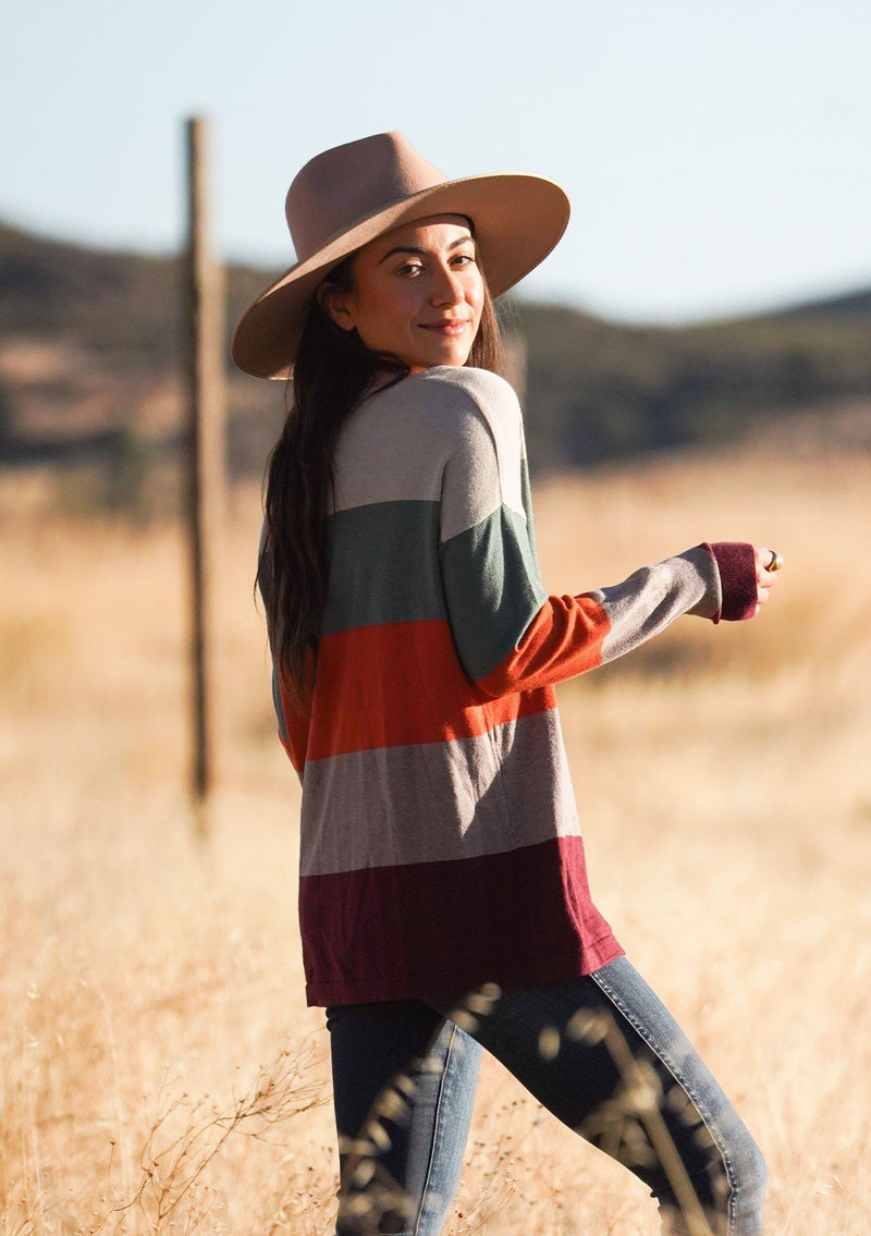[Color: Port Raspberry] A bold color block striped knit sweater, featuring a contrast front pocket, a wide crew neckline, and an easy, relaxed fit. Perfectly soft and cozy, this lightweight pullover looks great styled with denim.