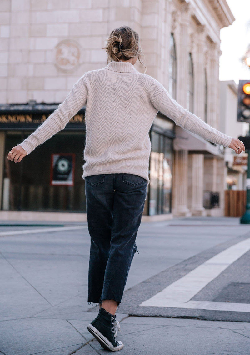 [Color: Heather Petal] A classic shawl pullover sweater, available in two chic neutral colors. Featuring a cozy shawl collar, a deep v neckline, and an essential front pocket.