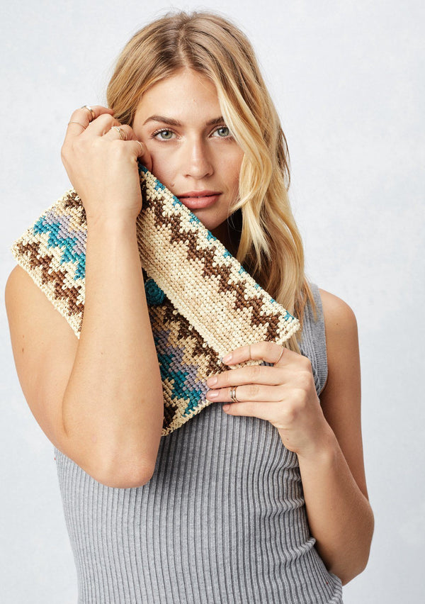 [Color: Natural/Blue] Lovestitch natural & blue, lightweight, zig-zag patterned raffia clutch with single button closure. 