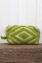 [Color: Lime Green] A green bohemian carpet makeup bag with pom tassel. 