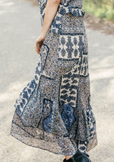 [Color: Navy/Sky] Lovestitch navy/sky floral paisley printed, flutter sleeve maxi dress with tiered, ruffled detail.