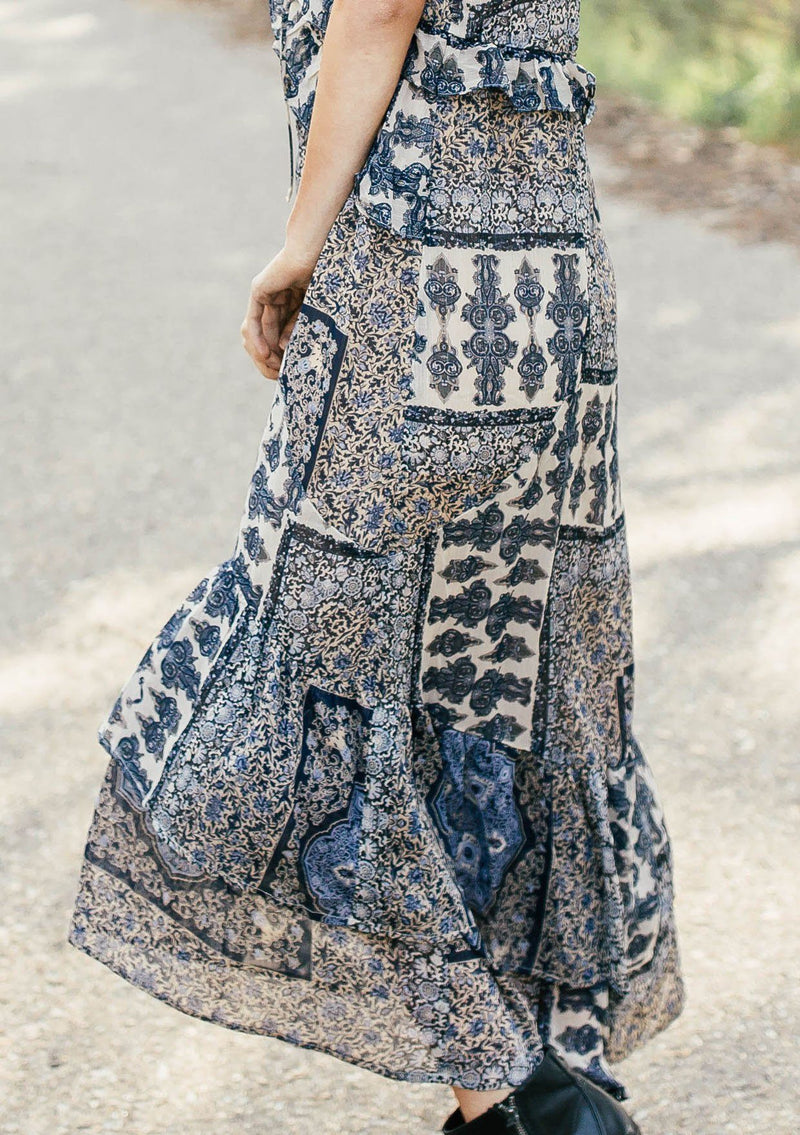 [Color: Navy/Sky] Lovestitch navy/sky floral paisley printed, flutter sleeve maxi dress with tiered, ruffled detail.