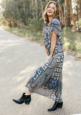 [Color: Navy/Sky] Lovestitch navy/sky floral paisley printed, flutter sleeve maxi dress with tiered, ruffled detail.