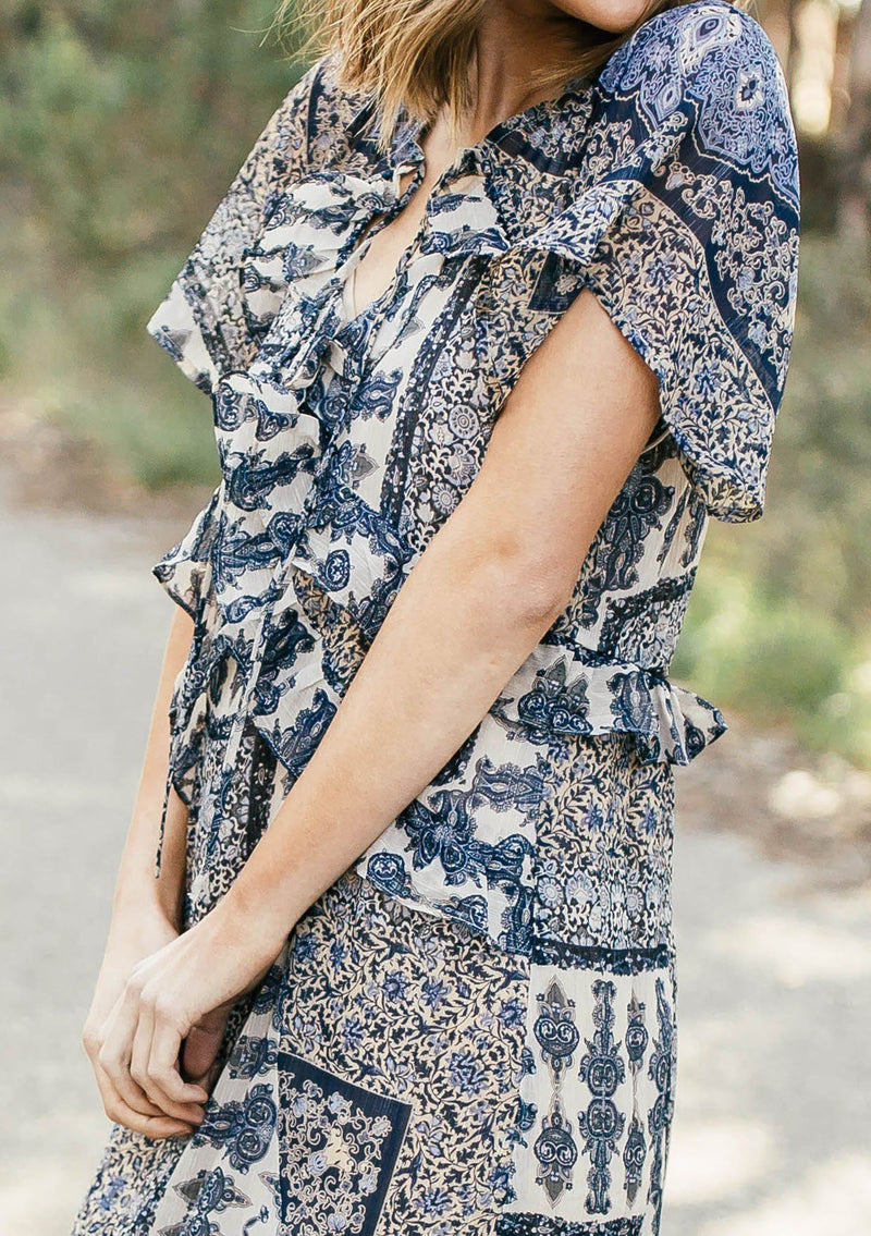 [Color: Navy/Sky] Lovestitch navy/sky floral paisley printed, flutter sleeve maxi dress with tiered, ruffled detail.