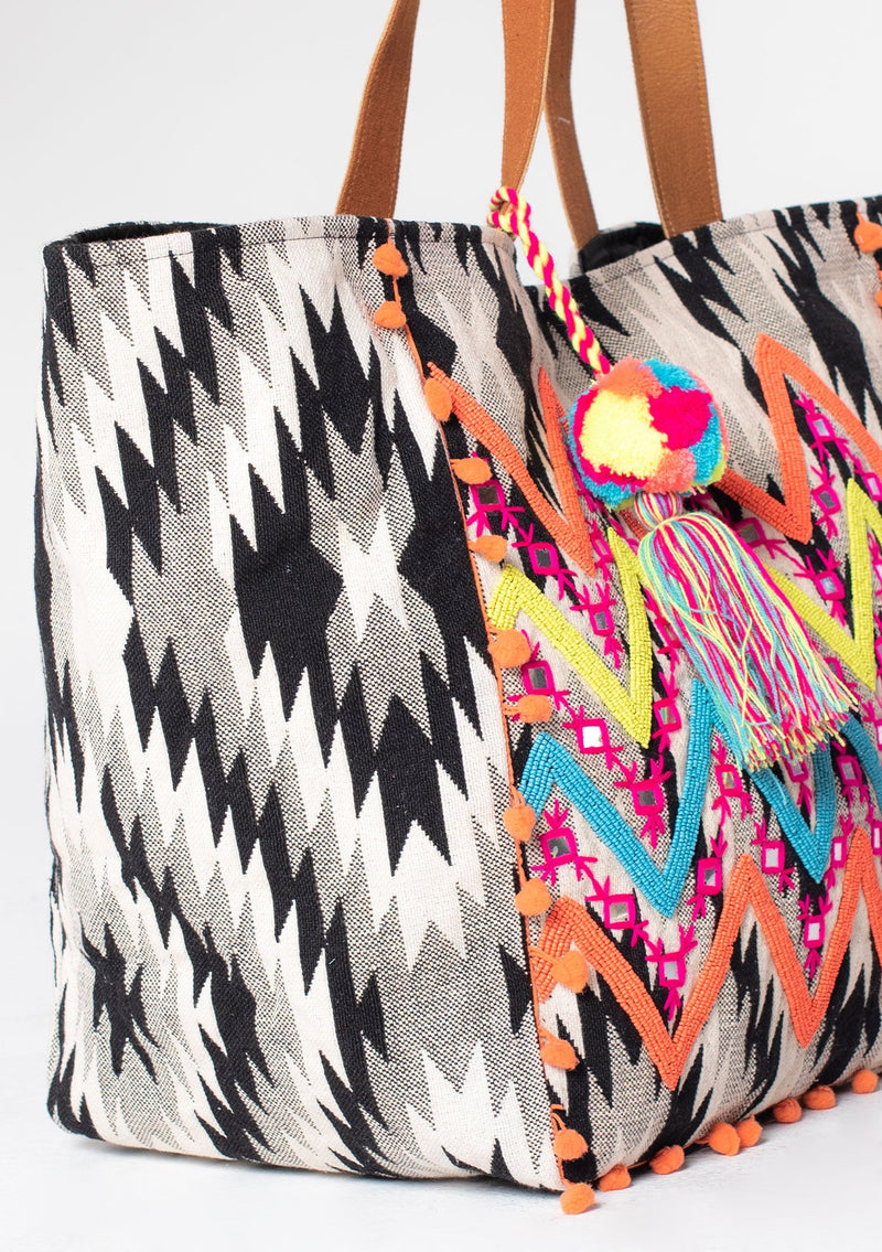 [Color: Black/White/Coral] Bohemian black and white jacquard tote bag with multi color beaded chevron design, suede leather handles, and mirrored embellishments. 