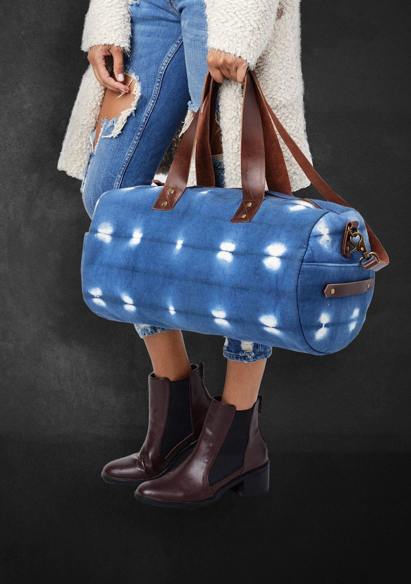 [Color: Blue/OffWhite] Blue tie dyed duffel bag. 