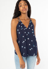 [Color: Navy Turquoise] Cute and effortless tie back tank top. Features an allover floral print.