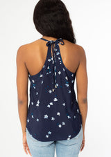 [Color: Navy Turquoise] Cute and effortless tie back tank top. Features an allover floral print.