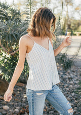 [Color: Natural/Red] A breezy Summer tank top in yarn dye stripes. With a button front, adjustable spaghetti straps, and a v neckline in front and back.